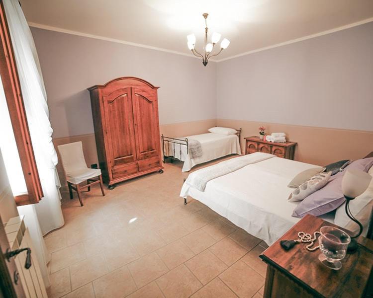 Palazzo Le Muse Apartments Bevagna Bagian luar foto